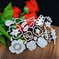 Silver carbon steel flower cutting die with plant etching pattern measuring 14.3 by 9.9 cm
