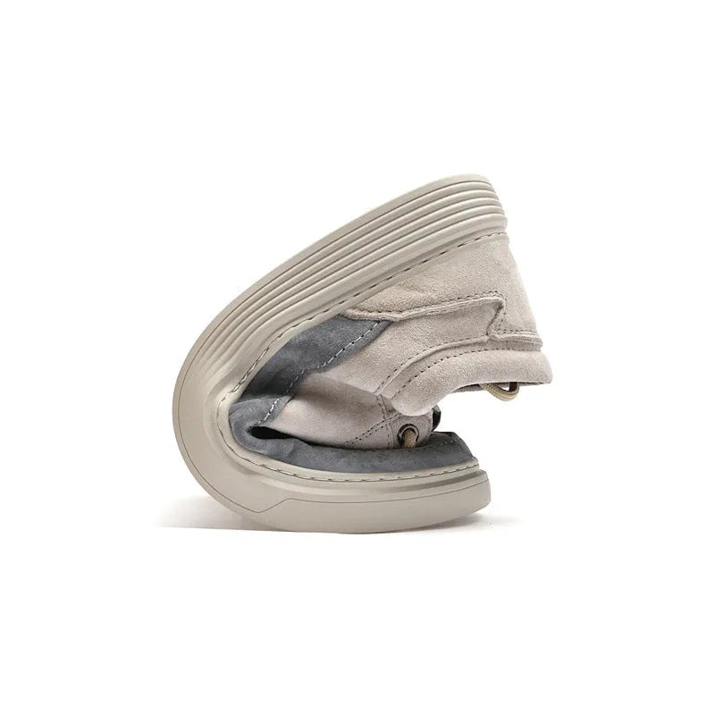 Men's gray casual skate shoes with pigskin upper and rubber sole on a white background.