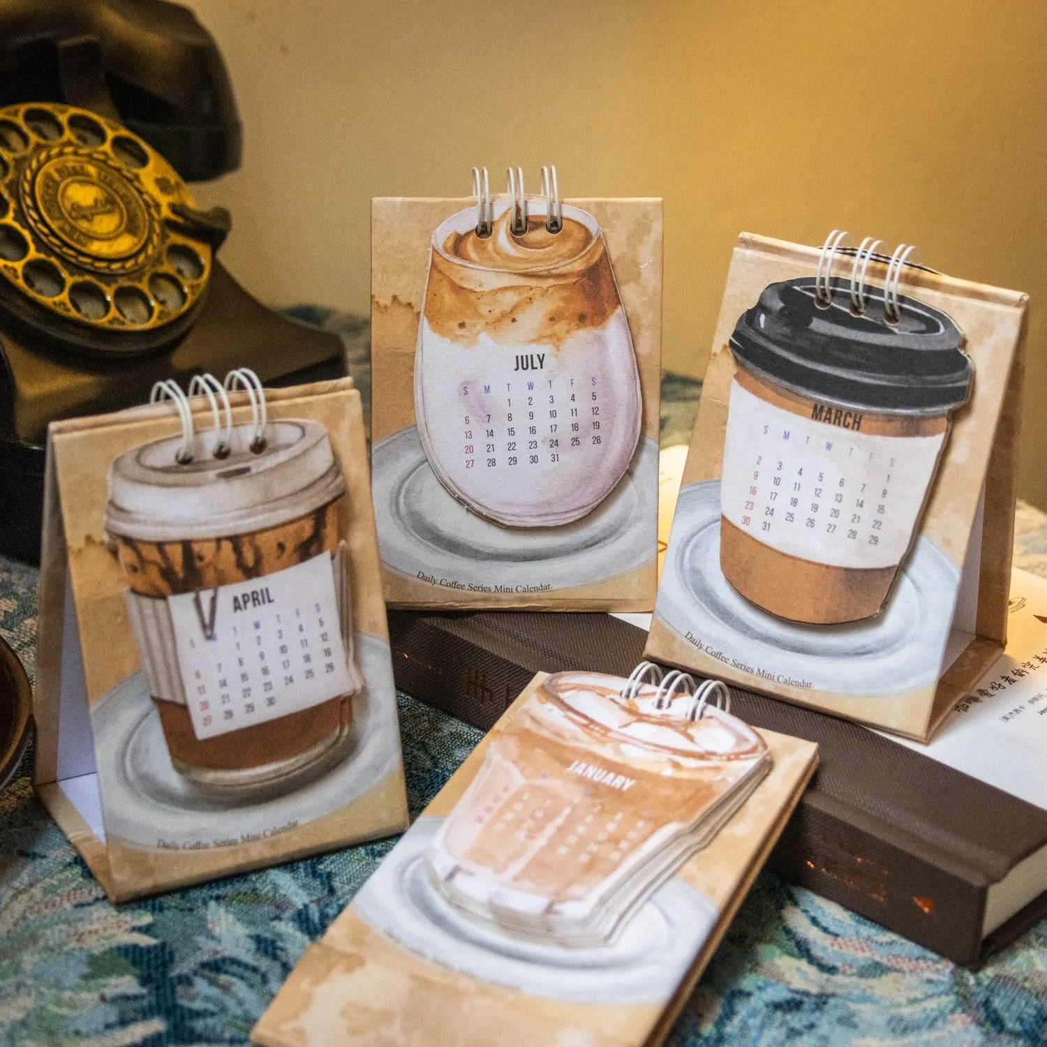 Mini 2025 desk calendar with themed designs for small desk spaces