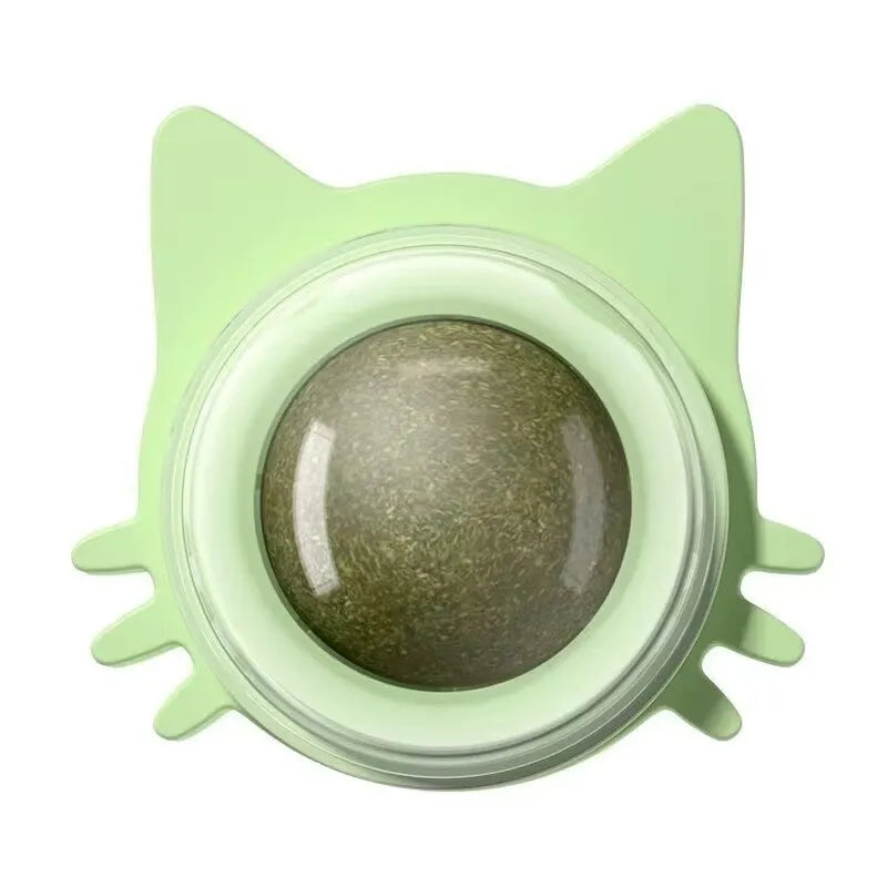 Colourful rotating catnip ball wall toy with edible mint material in cat face shape