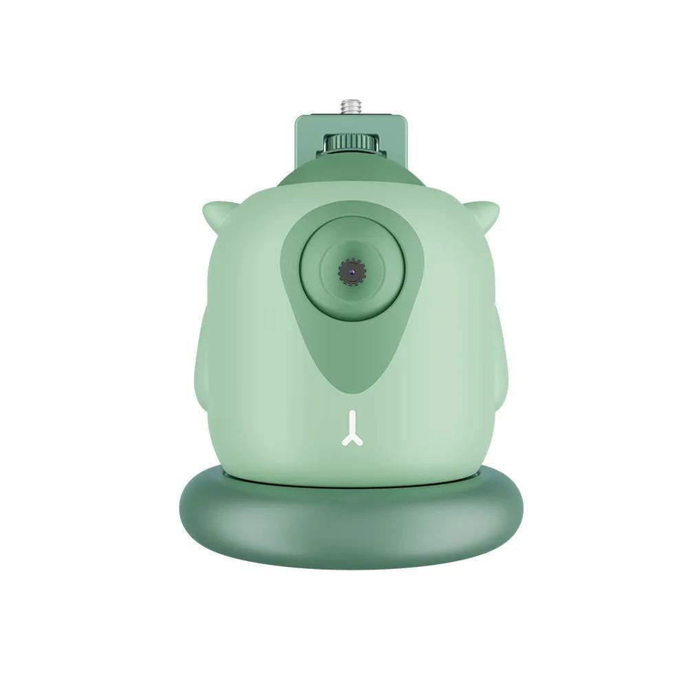 Dark green intelligent AI face recognition gimbal with 360-degree rotation on a desk.