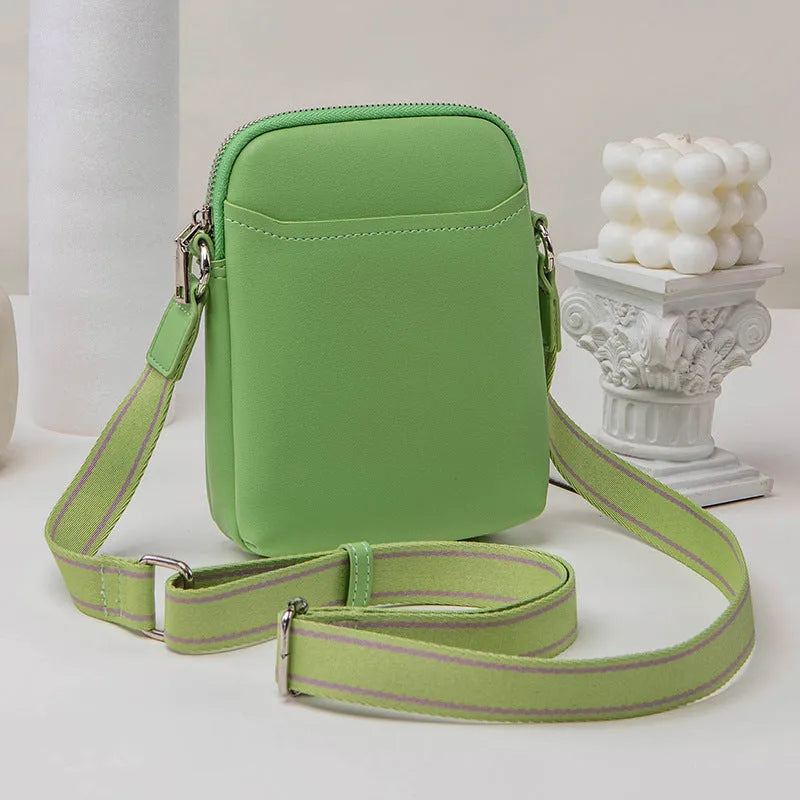 Solid colour women's PU crossbody phone bag shown in beige, displaying front view.