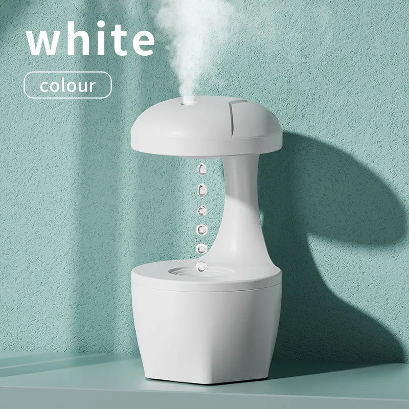 White portable 800ml USB humidifier with anti-gravity cool mist droplet effect for bedroom aromatherapy