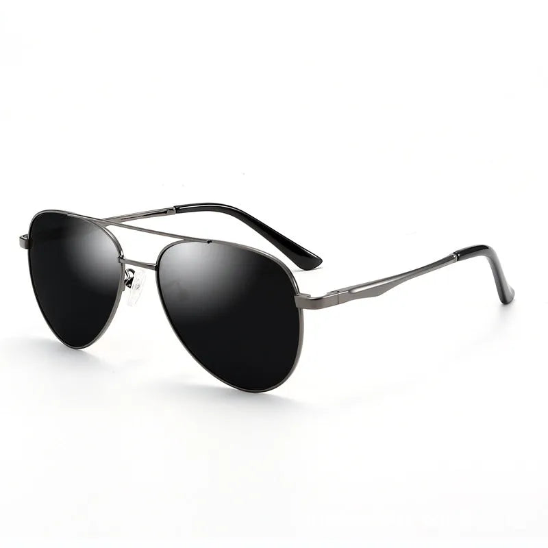 Retro classic vintage sunglasses with gold frame and black grey TAC polarised lenses on a white background