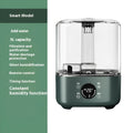 Green KC-112 intelligent large capacity humidifier with touch screen and remote control on a table.