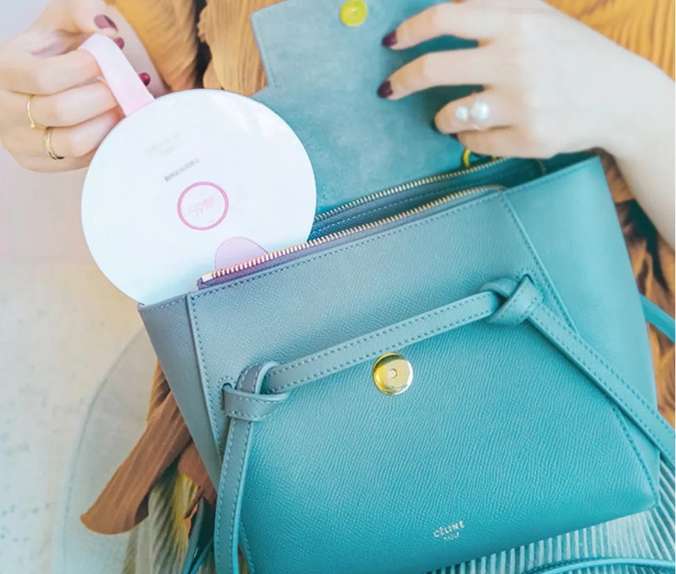 Blue portable UV baby bottle steriliser with USB charging port and compact dimensions