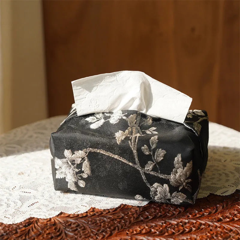 White and red embroidered white plum brocade fabric tissue box cover with optional pearl buckle, shown next to measurements.