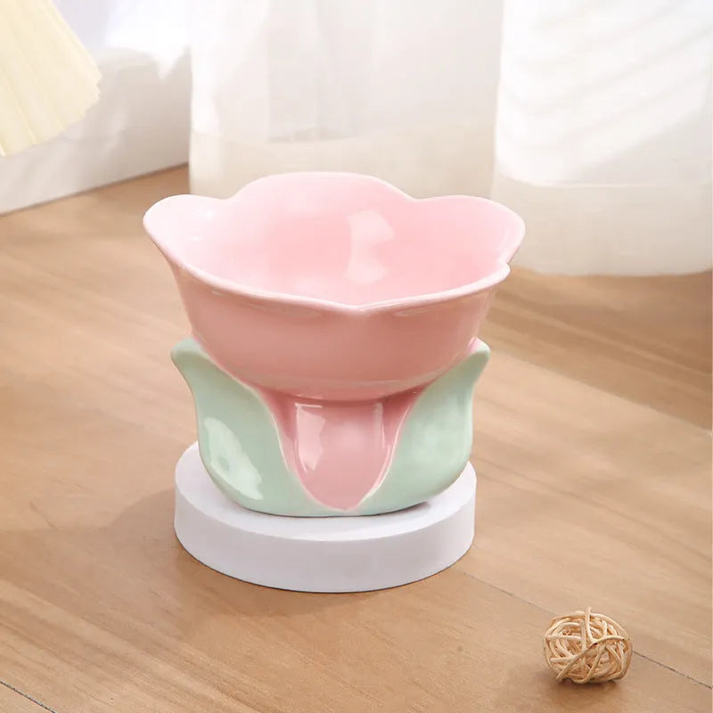 Blue ceramic pet bowl with floral pattern and elevated design for cats and small dogs