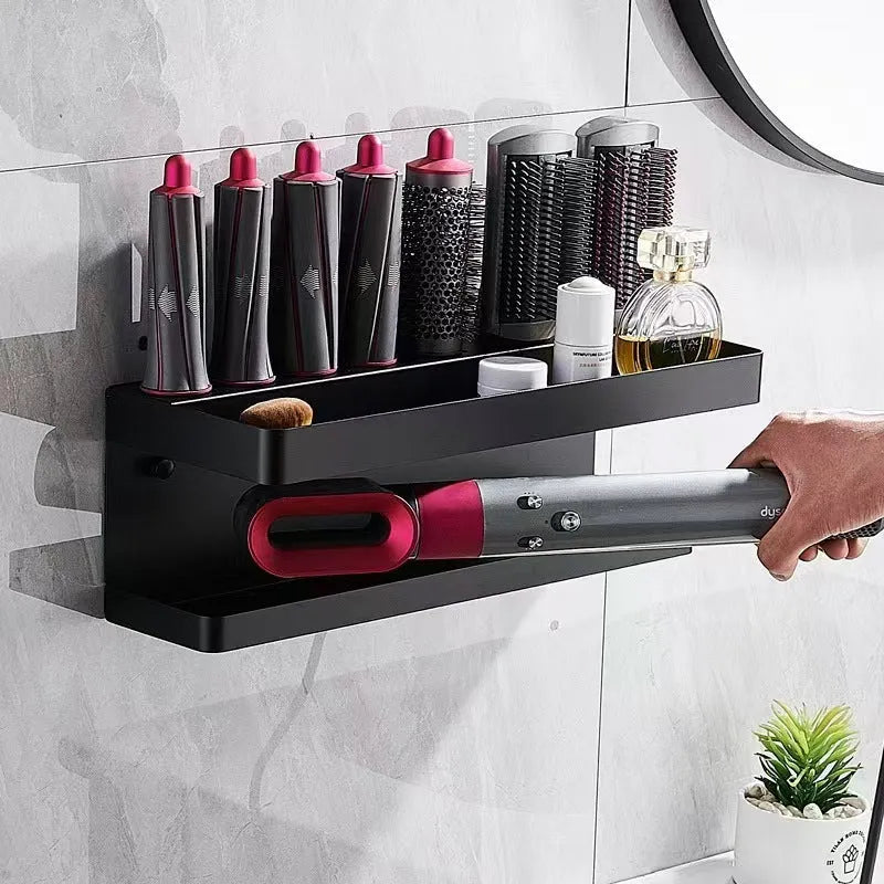 White aluminium double-layer punch-free storage rack holding a Marcel waver curling iron on a bathroom wall.