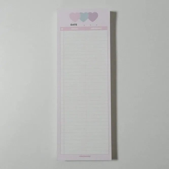Half-B5 size vertical notepad with coloured cover, shown open to show lined pages.