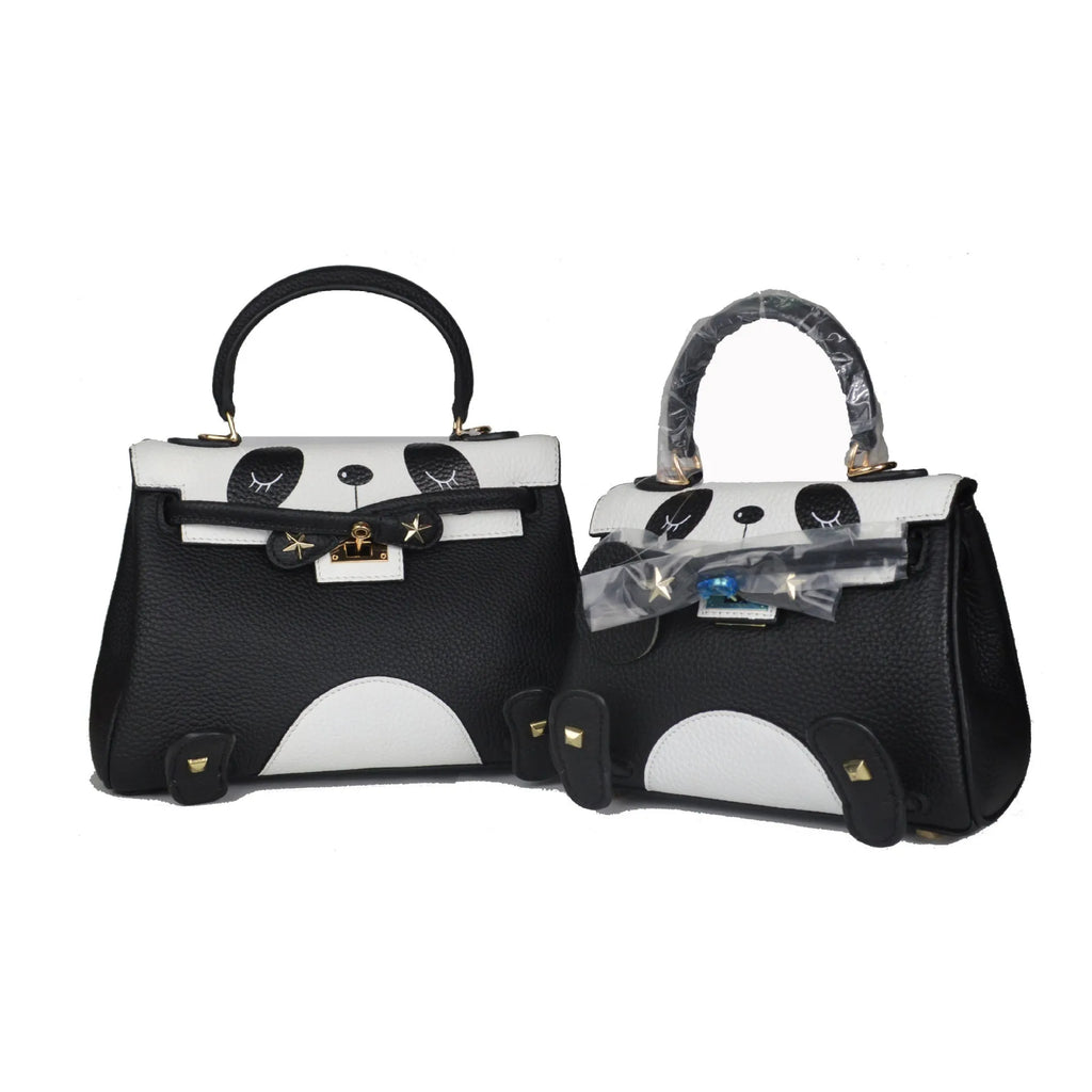 Black and white panda print on a structured horizontal square cowhide leather handbag with a trumpet detail.