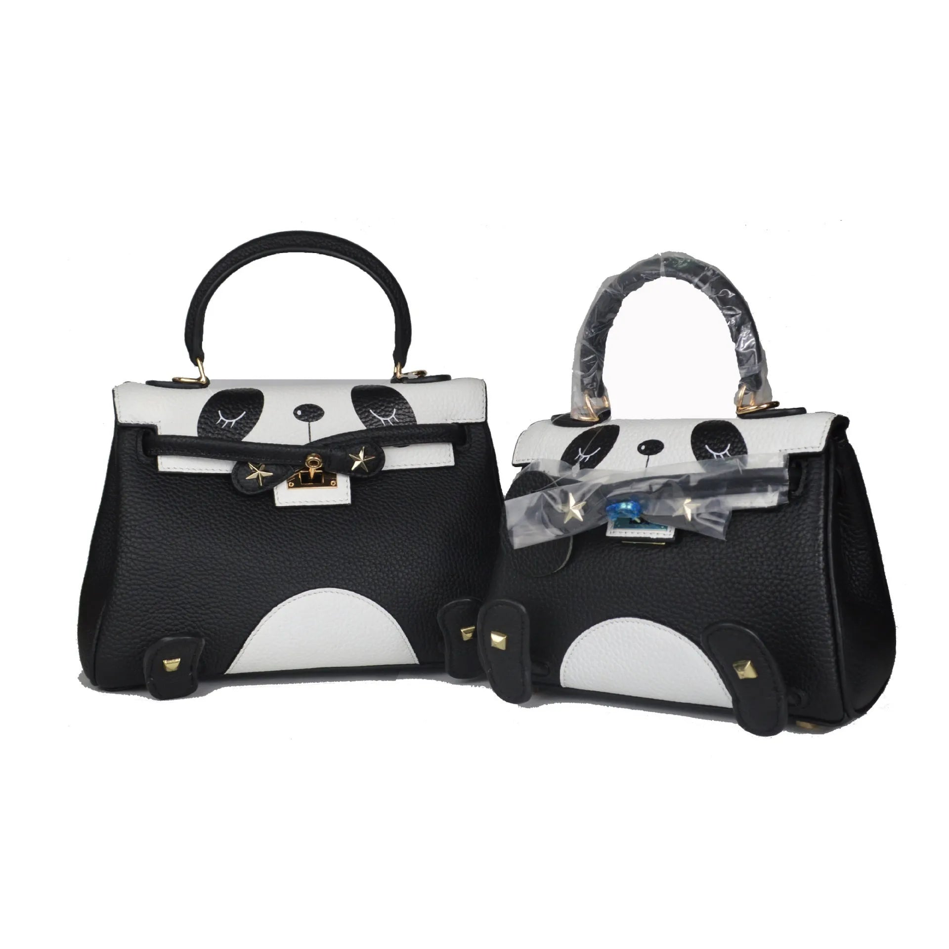 Black and white panda print on a structured horizontal square cowhide leather handbag with a trumpet detail.