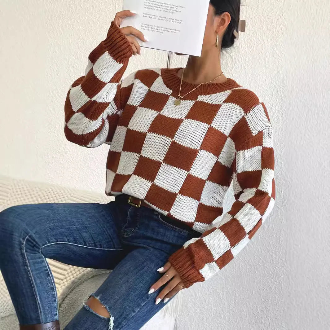 Dark brown plaid pattern acrylic pullover sweater with long sleeves and a round neck.