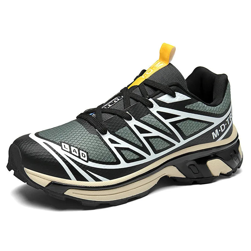 Low-top hiking shoes in artificial leather with mesh lining and a flat rubber sole.