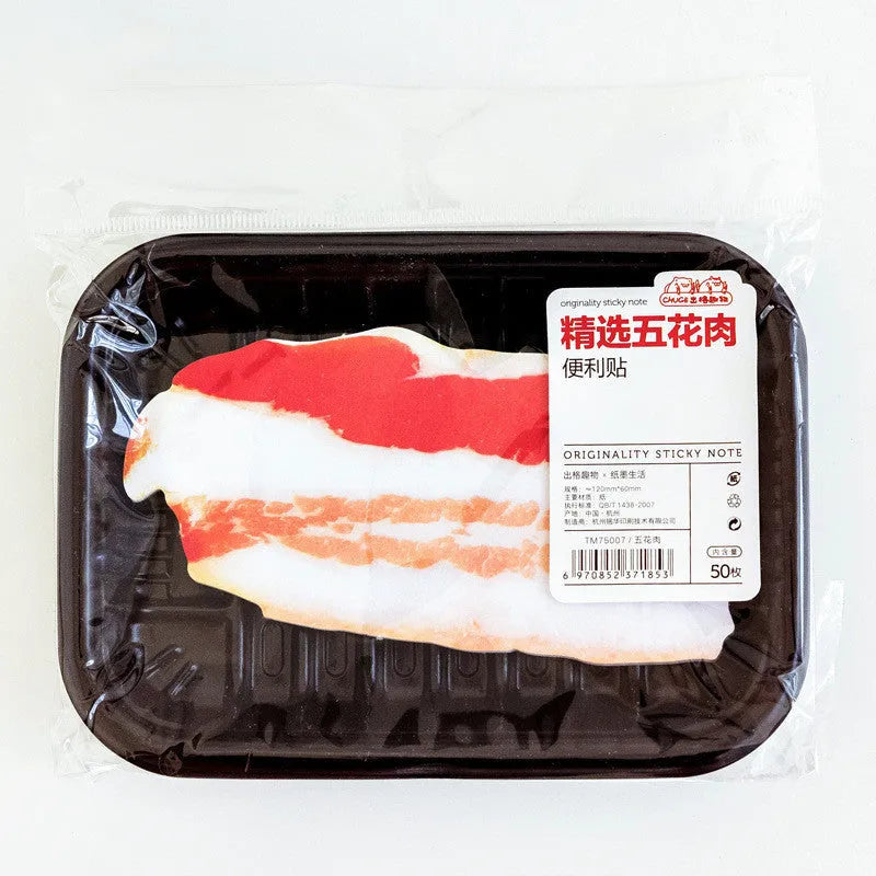 Post-it message notepad with food-themed cover design showing bacon, salmon or pork belly illustration
