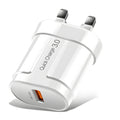 White and black smart mobile phone chargers with EU, UK, and US style plugs on a grey background