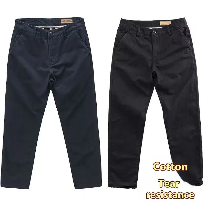 Men's slim fit casual trousers in a grey washed fabric with a straight leg.