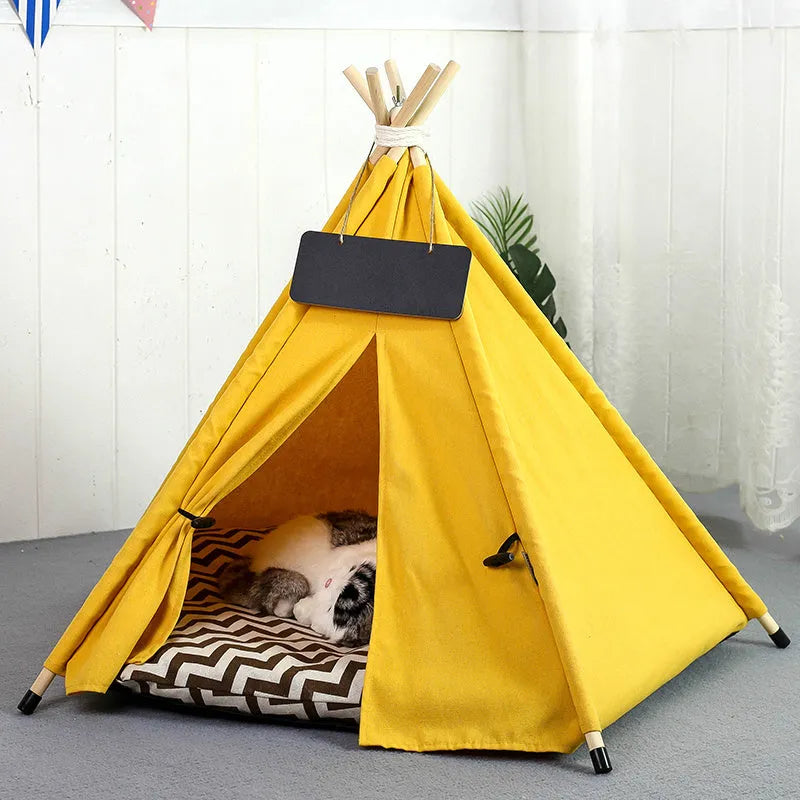 Striped flax and linen teepee tent pet bed for a small dog or cat, shown with a cushion inside.