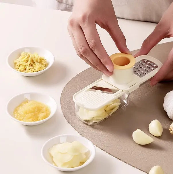 Stainless steel three-in-one ginger garlic grinder and potato slicer in beige colour