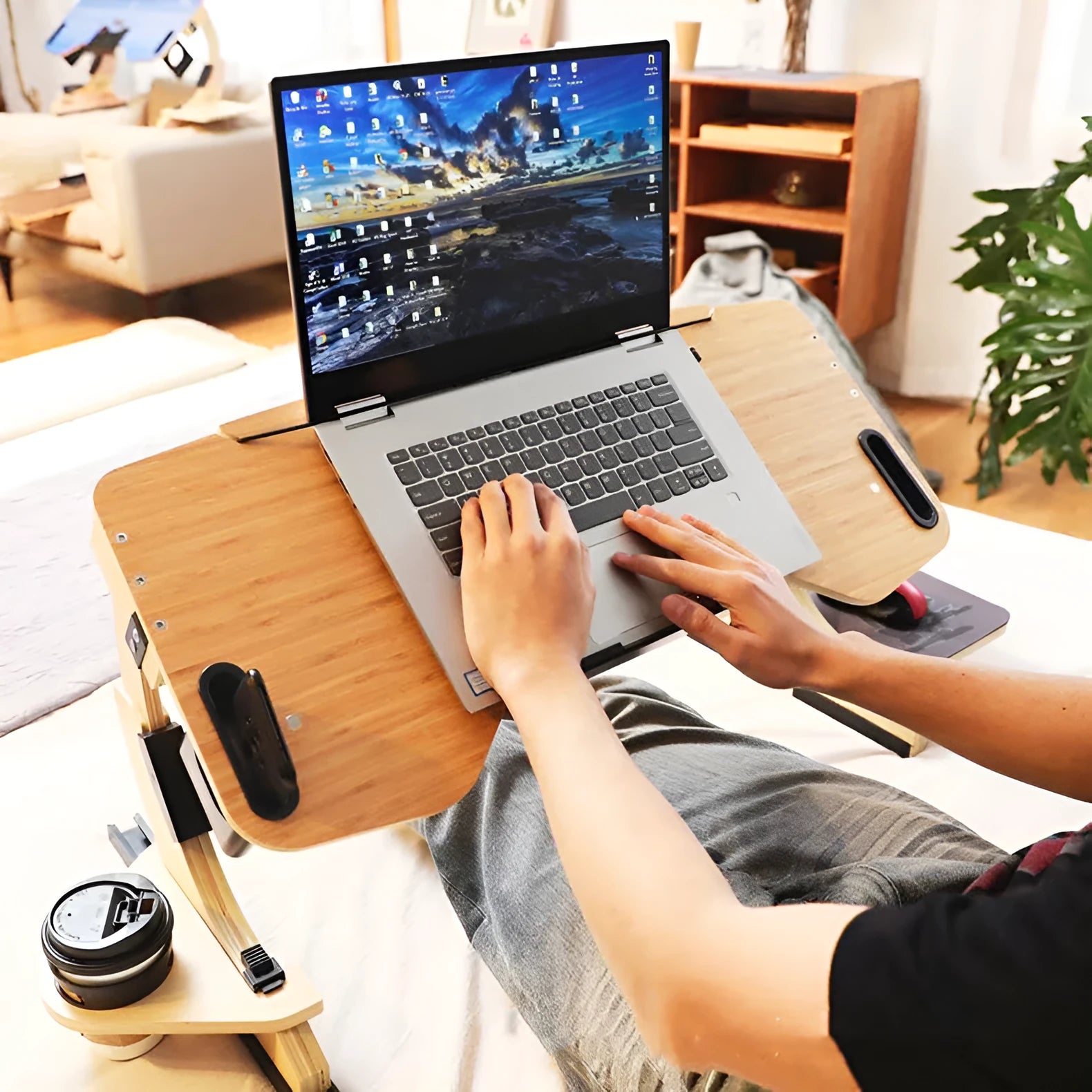 White maple wooden bed table with laptop at an angle, folded view shown next to it.