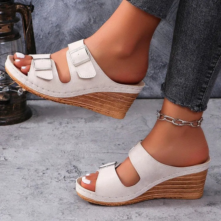 Women's beach slippers with outer wedge belt buckle in creamy-white, black, or maroon colours