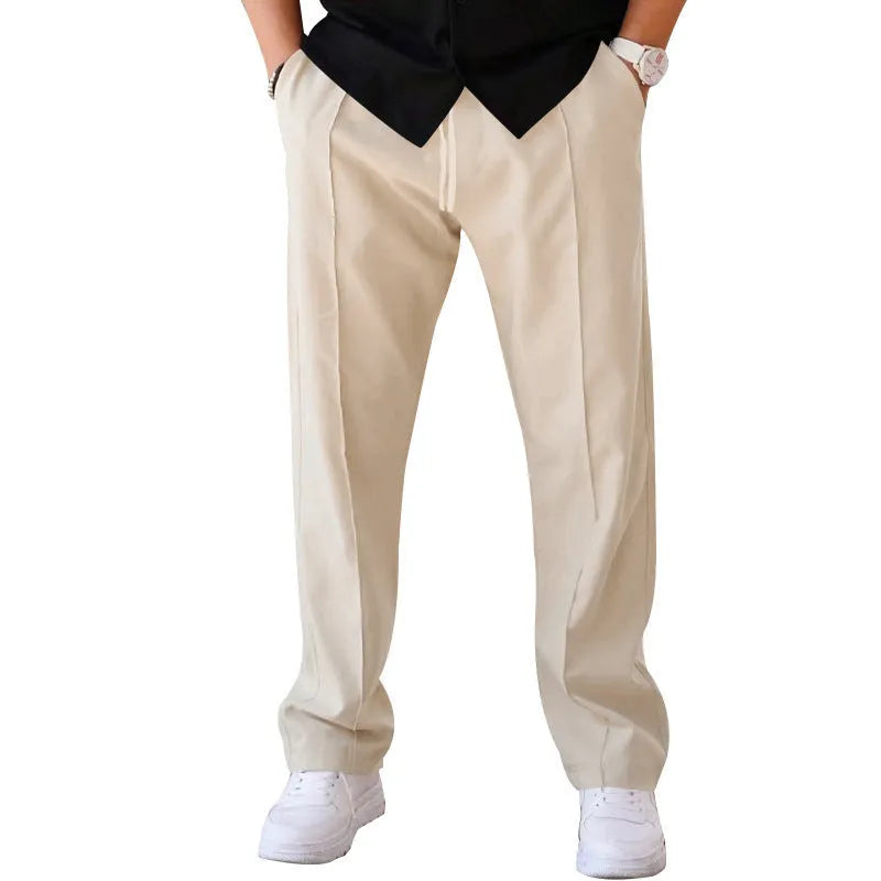 Men's loose straight trousers in waffle polyester with drawstring, available in multiple colours including black and light grey