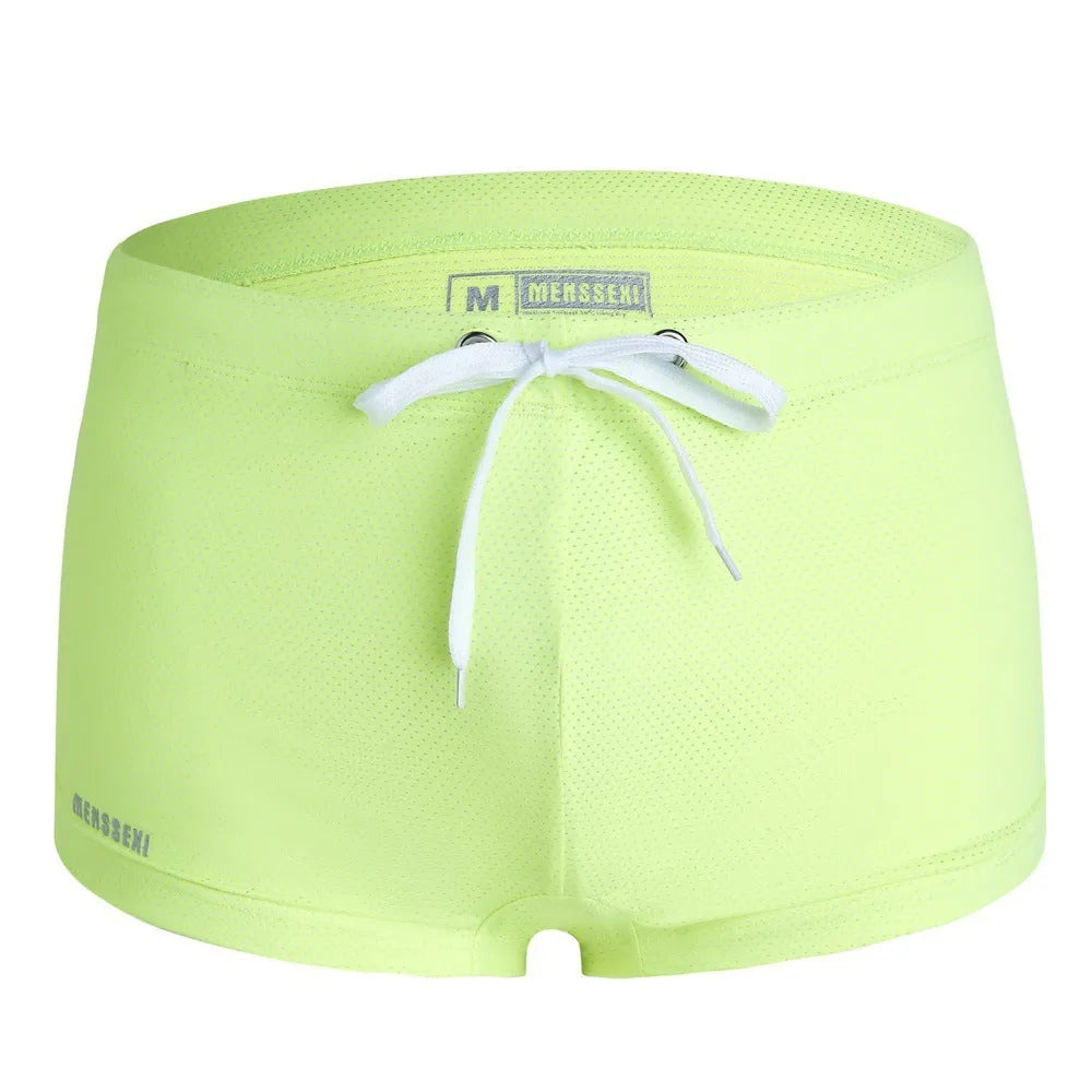 Men's low waist lace nylon boxer swimming trunks in multiple colours on a white background