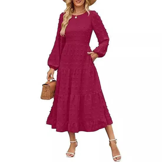 Women's beige high waist long sleeve dress with ruffled sleeves on a hanger.