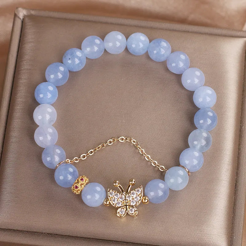 Sky blue butterfly crystal bracelet for women with pearl and rhinestone details