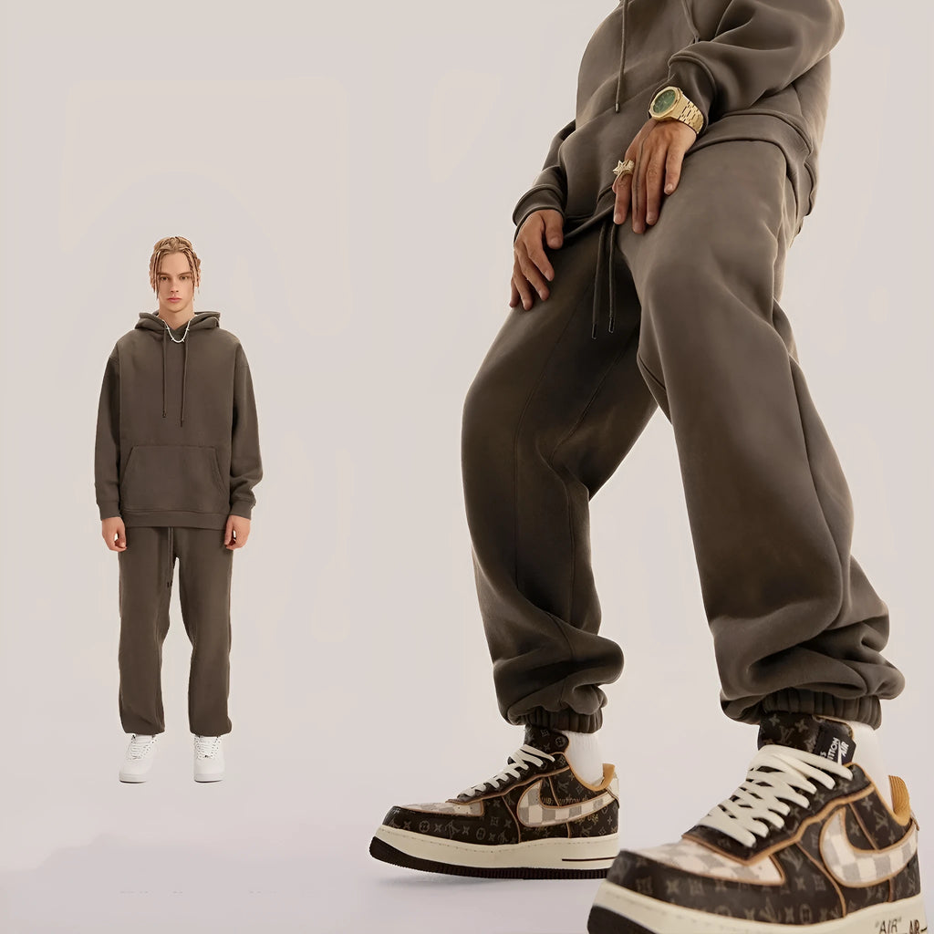 Men's solid colour cotton velvet sweatpants with ankle band design in brown