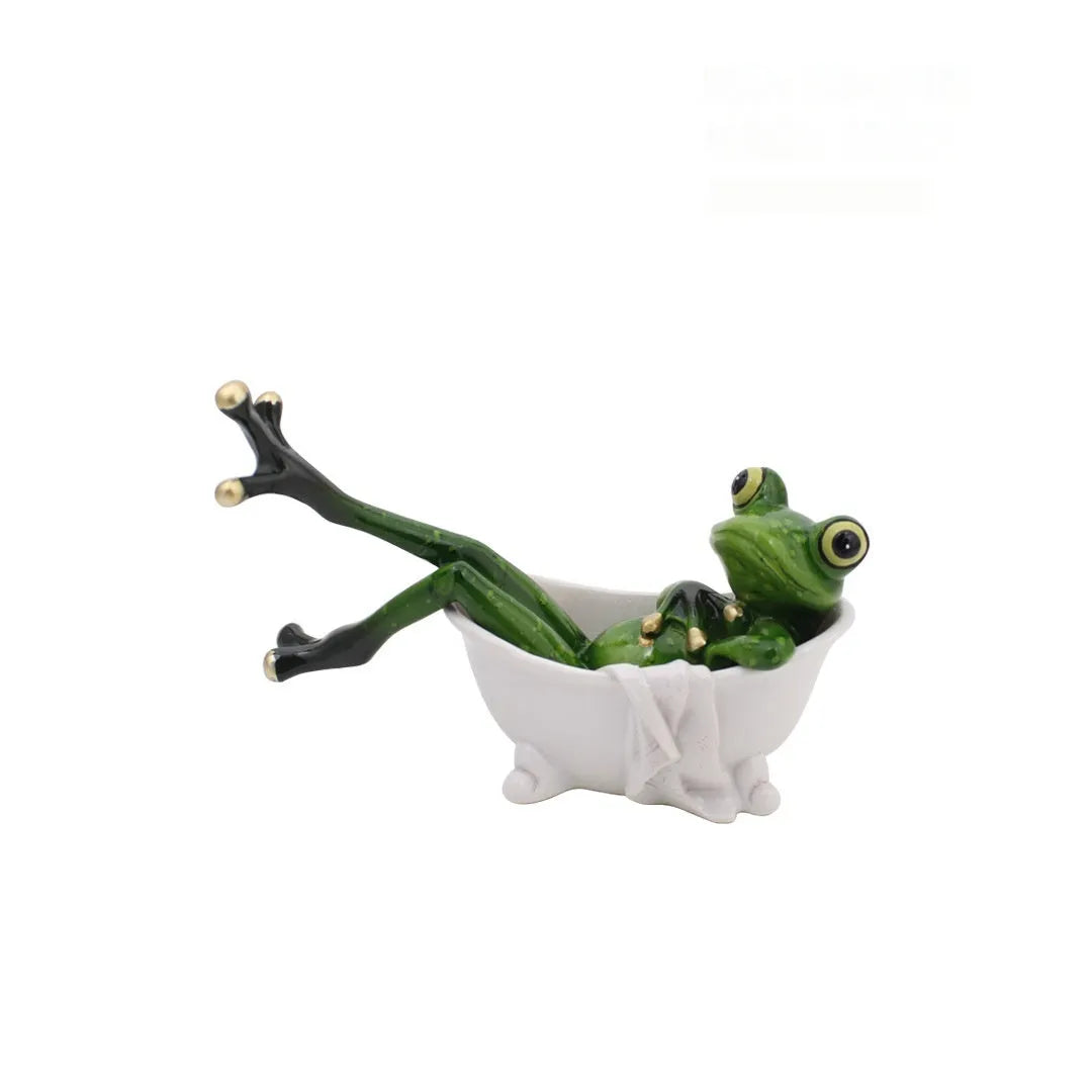 Pastoral style green resin frog decoration figurine on a wooden shelf.