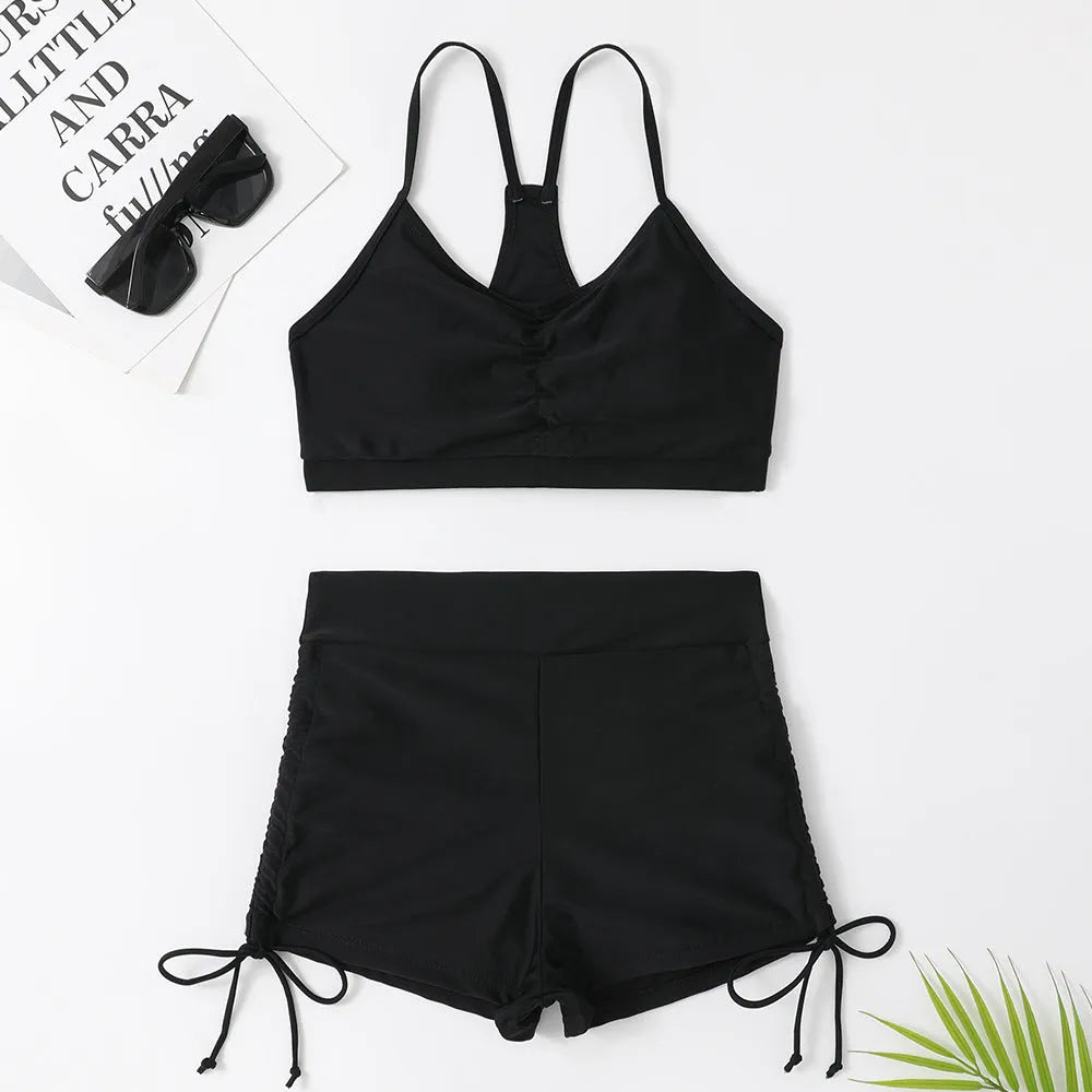 Purple high-waisted split bikini swimsuit for women on a white background.