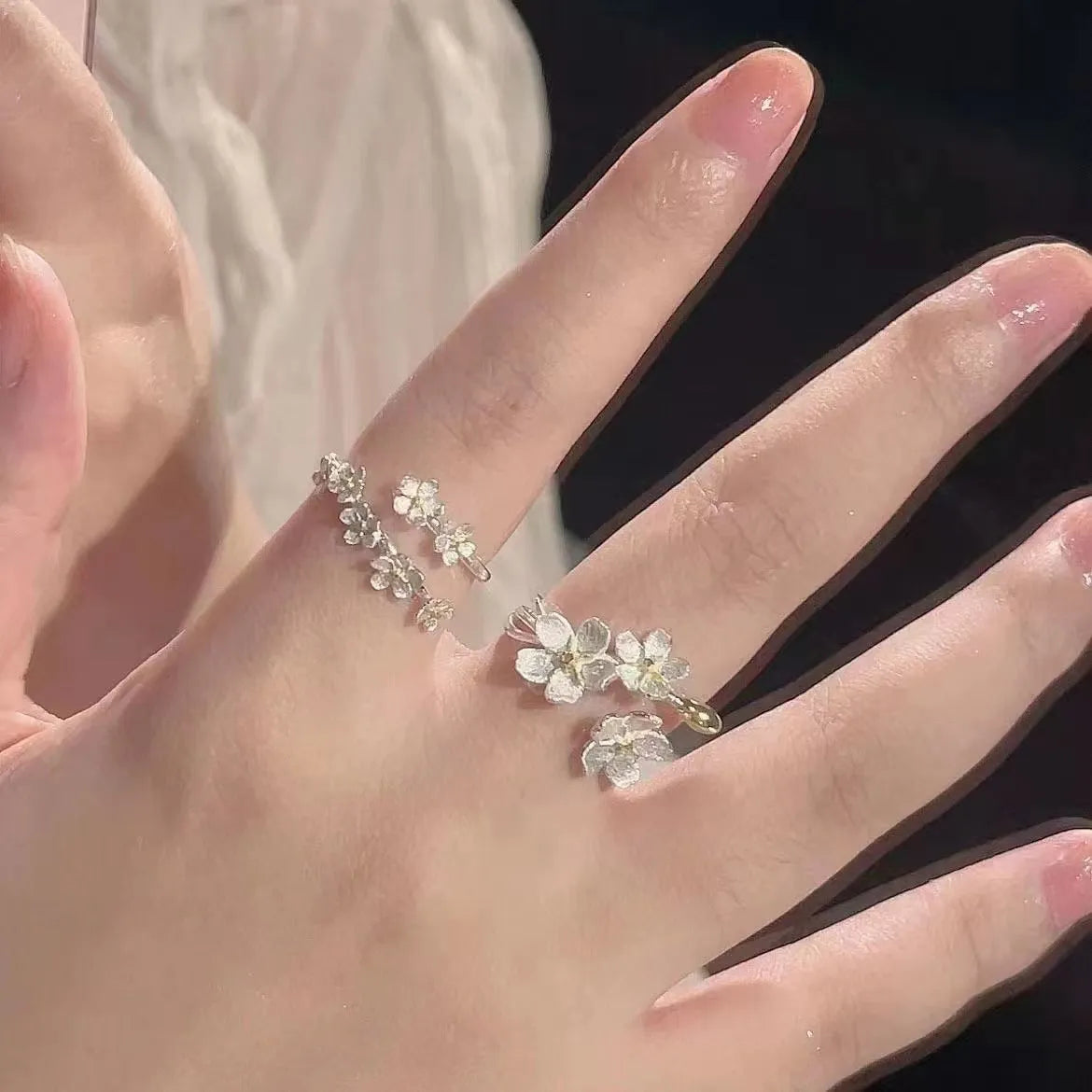 3D Jasmine flower ring with open mouth design in electroplated zinc alloy.
