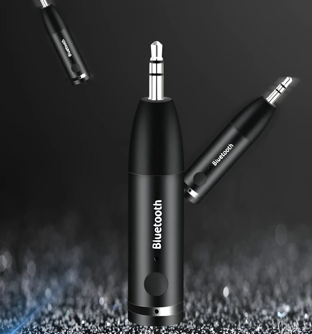Black Bluetooth audio receiver with AUX connector and USB charging port