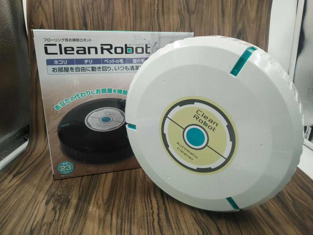 AC automatic sweeping robot vacuum cleaner in black or white on a hard floor