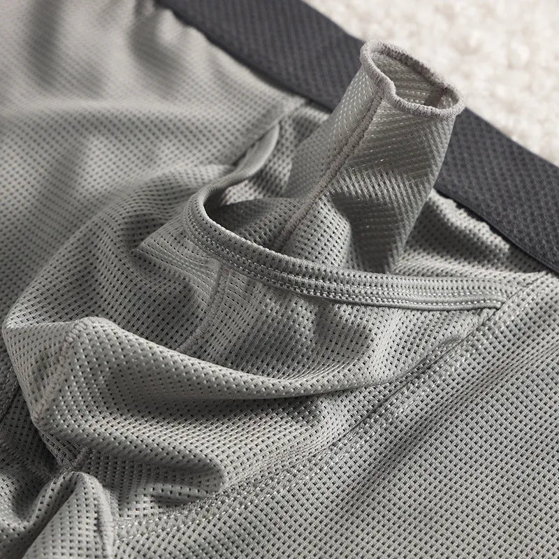 Men's ice silk boxer shorts with mesh fabric in black, white, and grey colour options