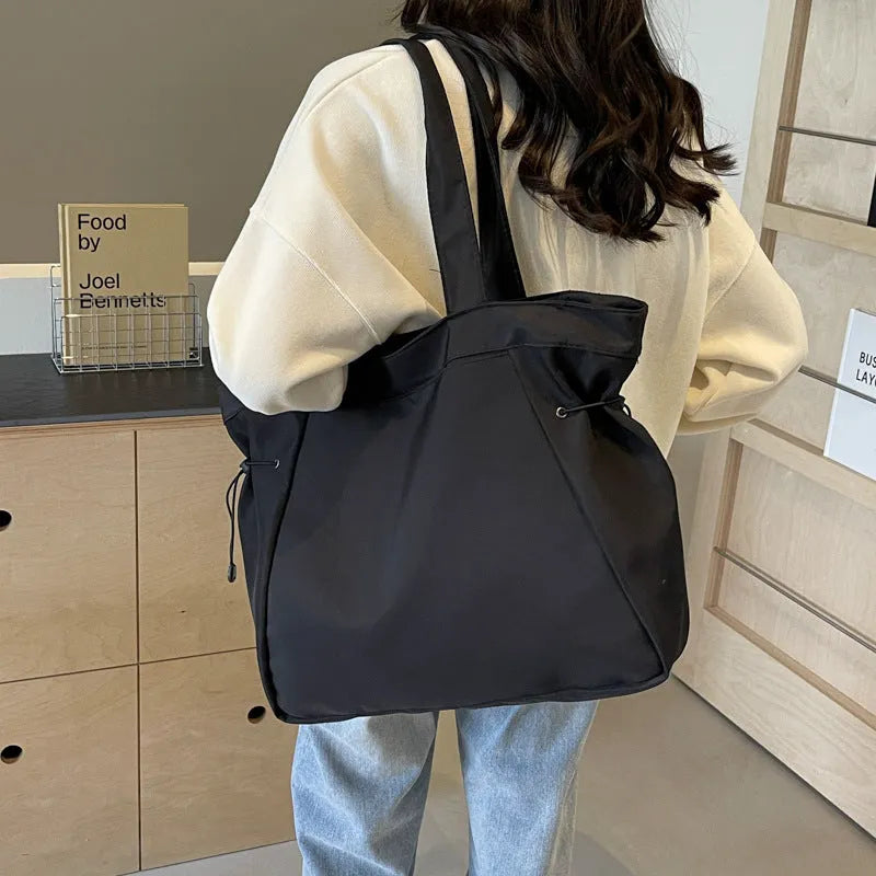 Soft foldable Oxford cloth tote bag in street trend style, shown in multiple colour options.