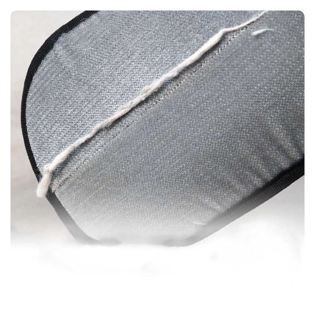 Pet electrostatic hair removal gloves with two-way bristles on a light background