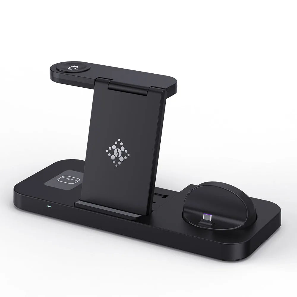White three-in-one wireless charging station for mobile phone, headphones and smartwatch on a desk.