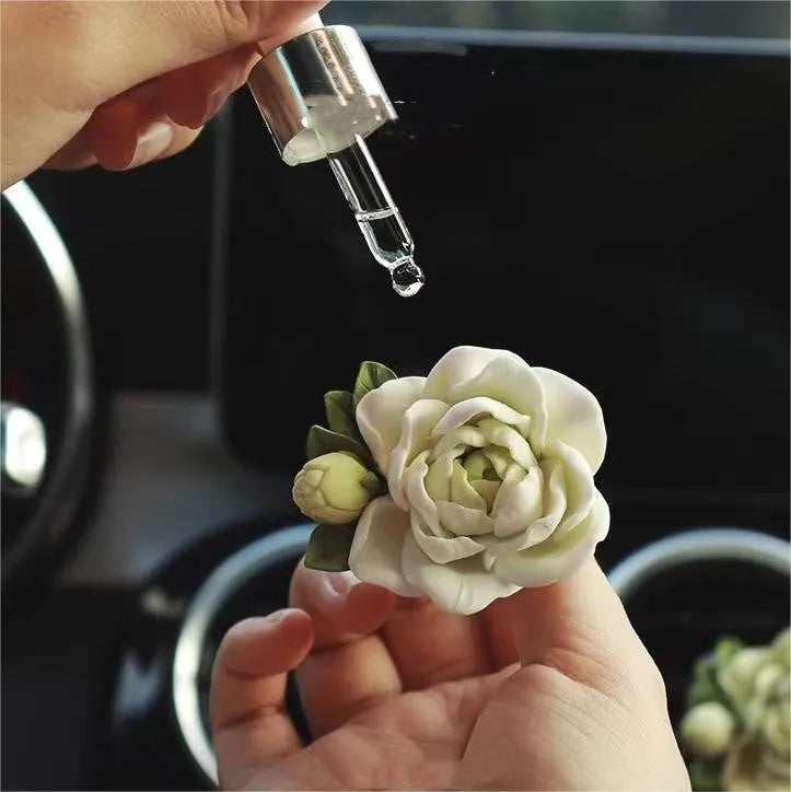 Jasmine car perfume solid gypsum diffuser measuring 5 by 4.5 centimetres with essential oil bottle