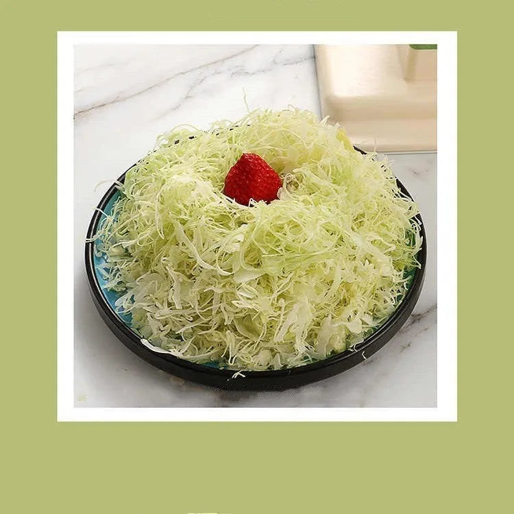Beige kitchen vegetable slicer and grater with stainless steel blades for healthy meal preparation