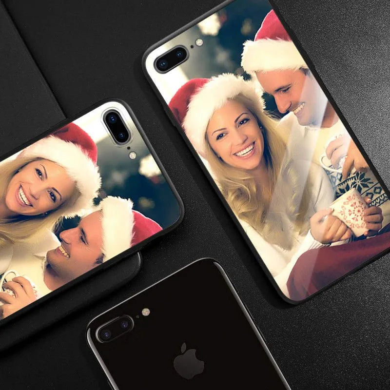 Patterned iPhone case with raised edges on a table next to an iPhone.