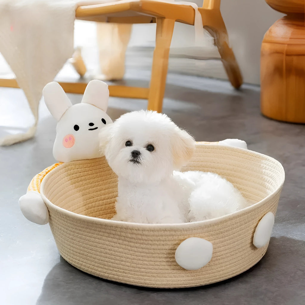 Woven cotton rope cat bed basket with integrated scratch pad, shown in three sizes.