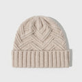 A woman's wool knitted winter hat in a dome crown style, shown in ankela red colour.