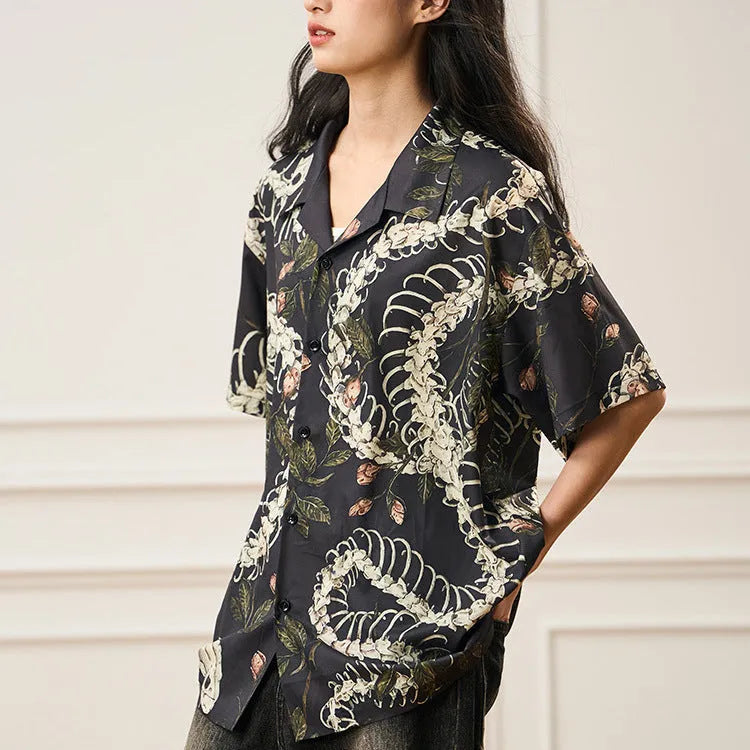 Short sleeve loose fit Cuban collar shirt with snake bone and floral printed pattern in various colours.