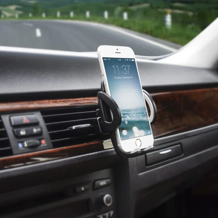 Black plastic car air conditioning outlet mobile phone holder mounted to car vent