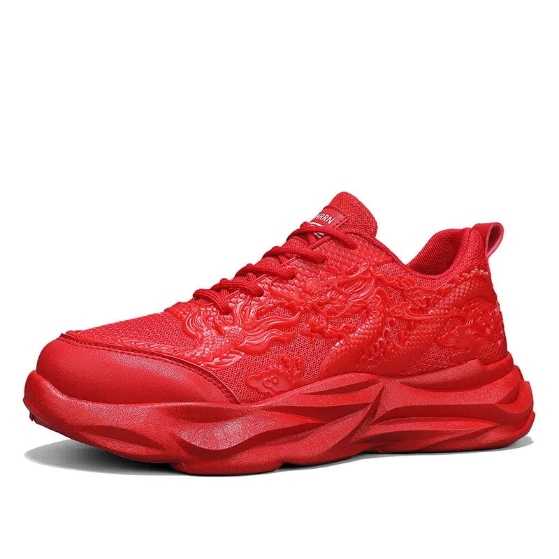 Fly knit casual sneakers with a dragon print on the side, showing the microfibre upper and rubber sole.