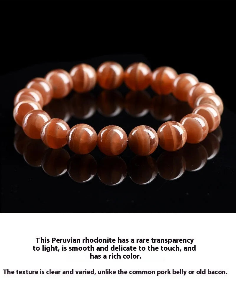 Natural Old Mine Rhodochrosite round bead bracelet with Ruyi design, shown in 6mm and 8mm sizes.