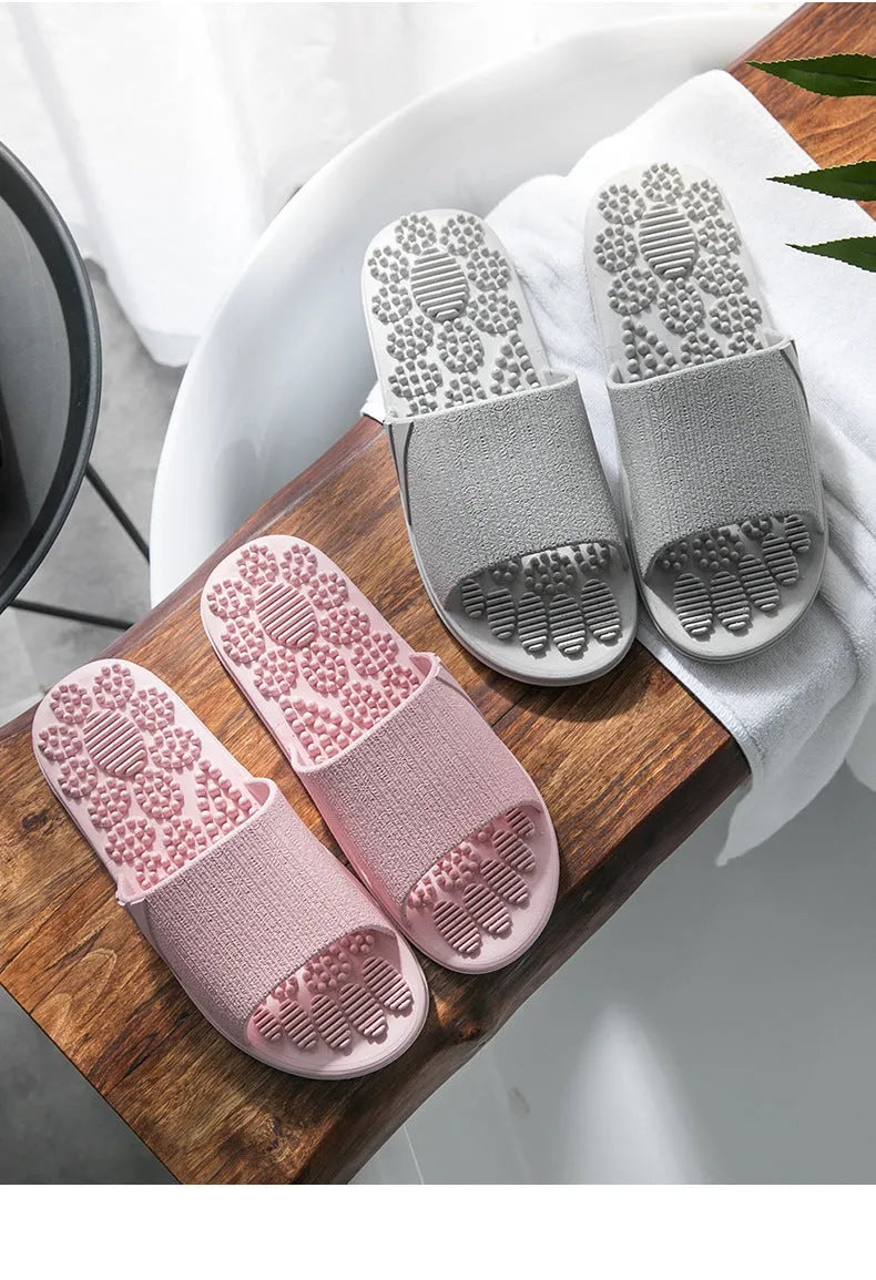 Reflexology acupressure slippers in EVA material with 3D massage particles, available in blue, grey, light blue, pink, purple