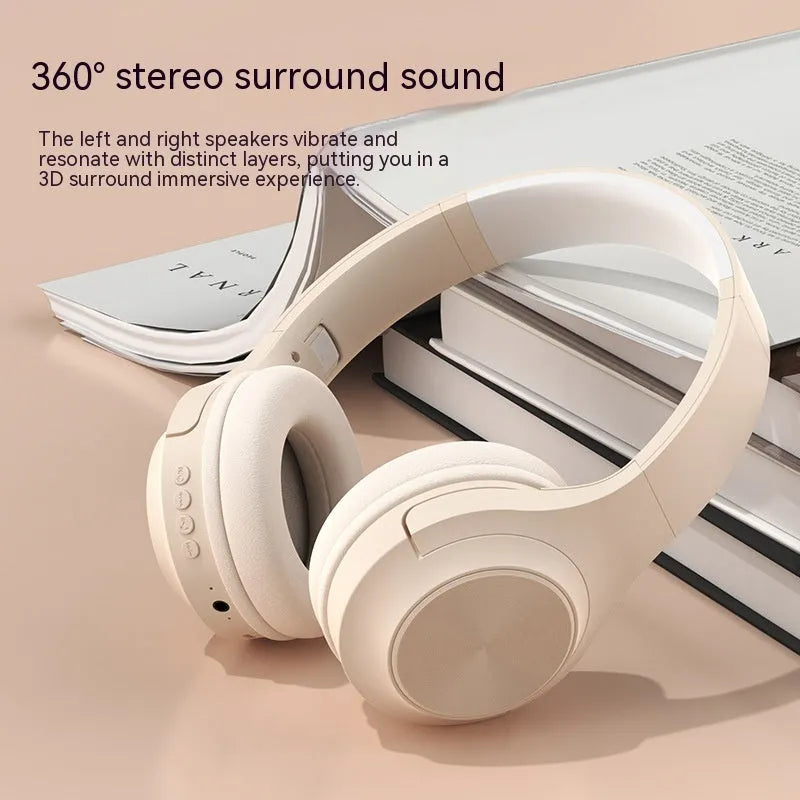 Creative wireless Bluetooth headset in Chalk Black colour with charging case on a table.